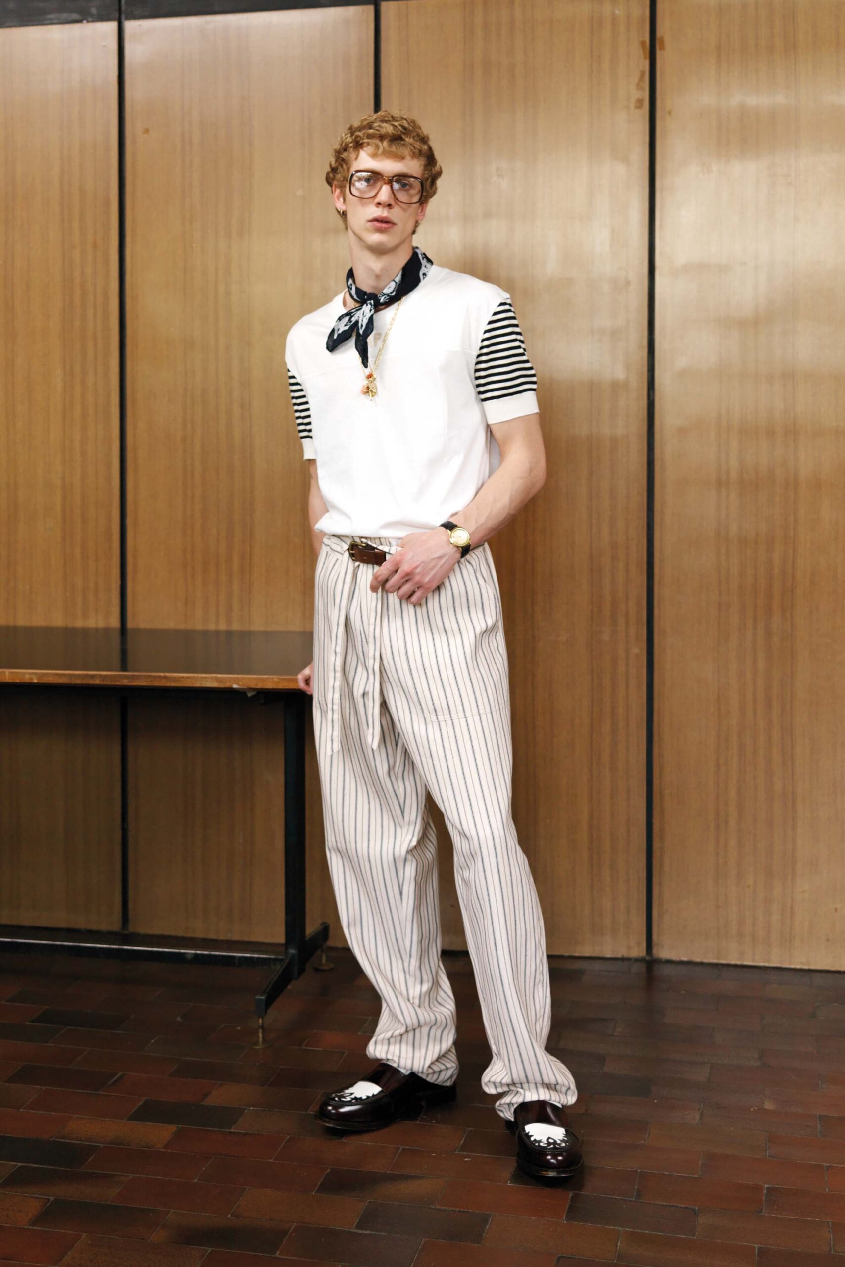 white relaxed t-shirt and striped pants