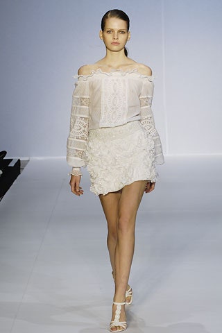 white off-shoulder blouse and mini skirt