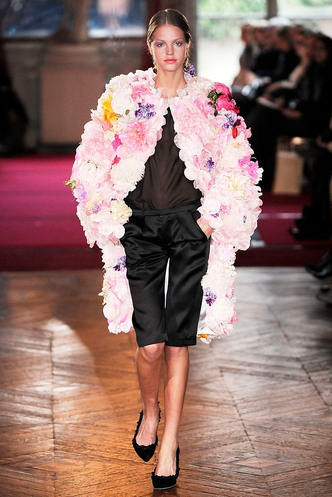pink floral coat with black shorts