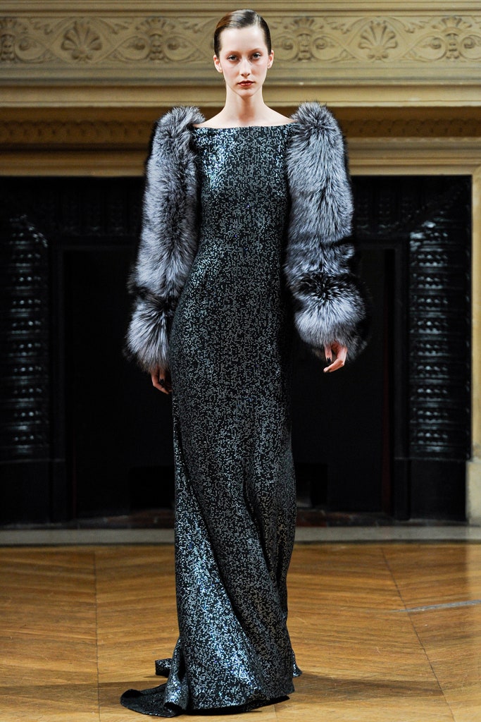 black sequined gown with fur sleeves