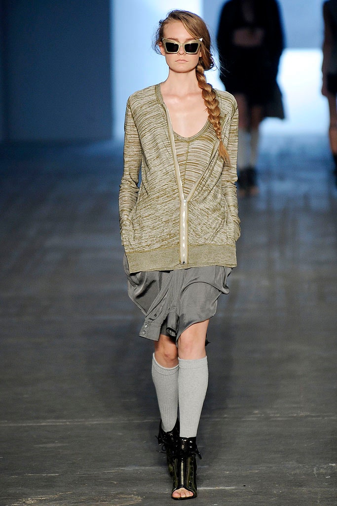 green cardigan with gray skirt