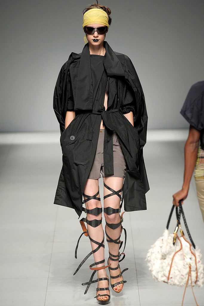 black relaxed coat with gray shorts
