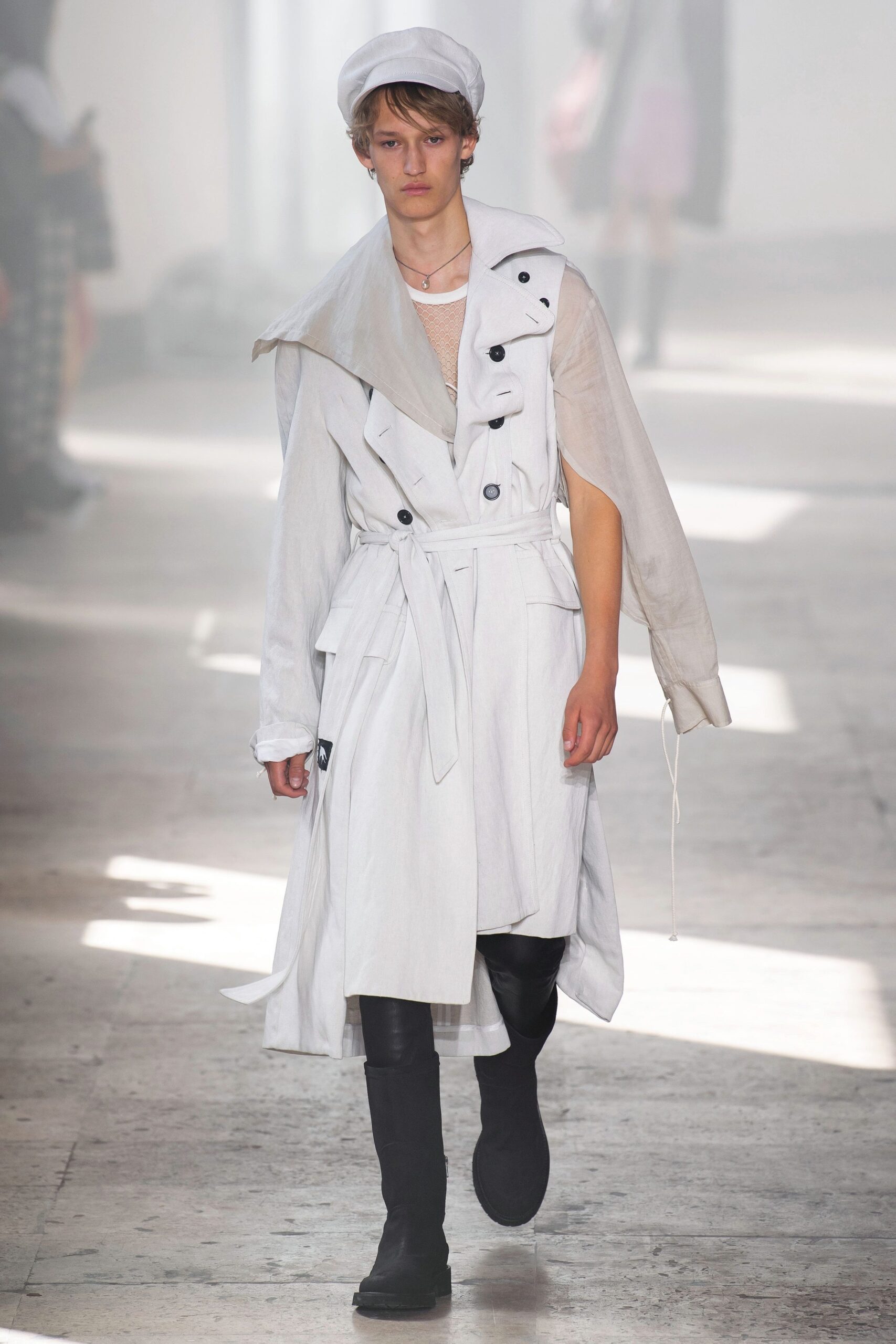 white trench coat with black pants