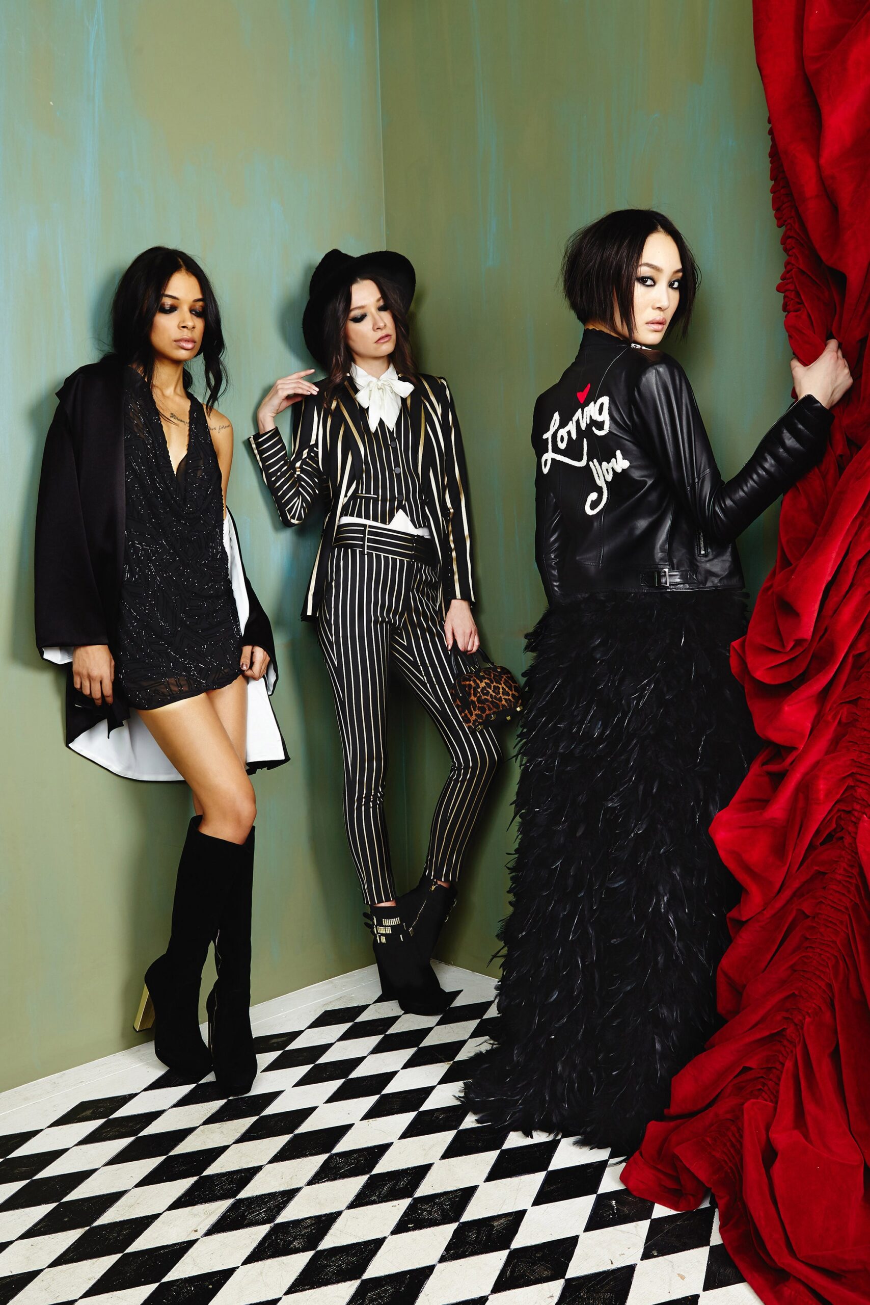 black fitted mini dress, tailored striped suit, embellished leather coat