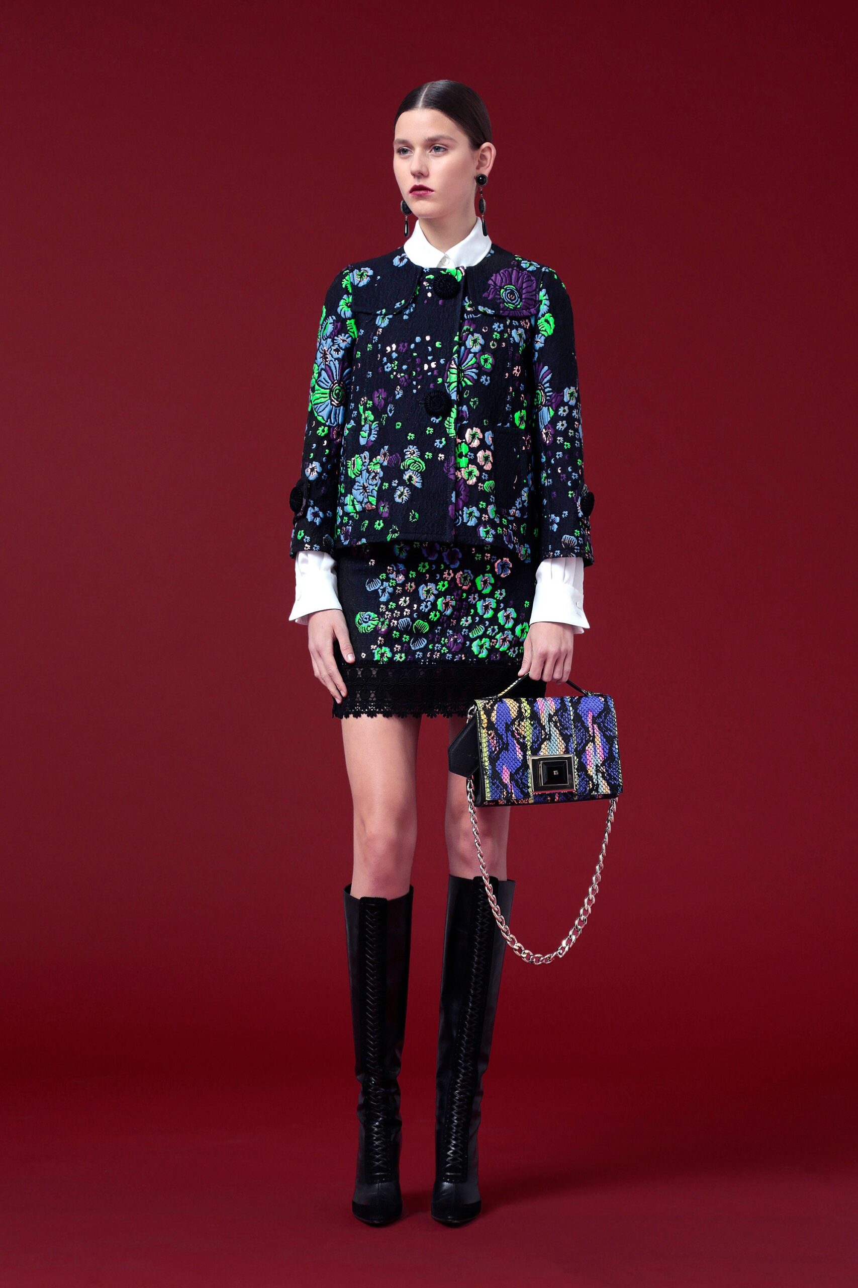 embroidered black top and mini skirt