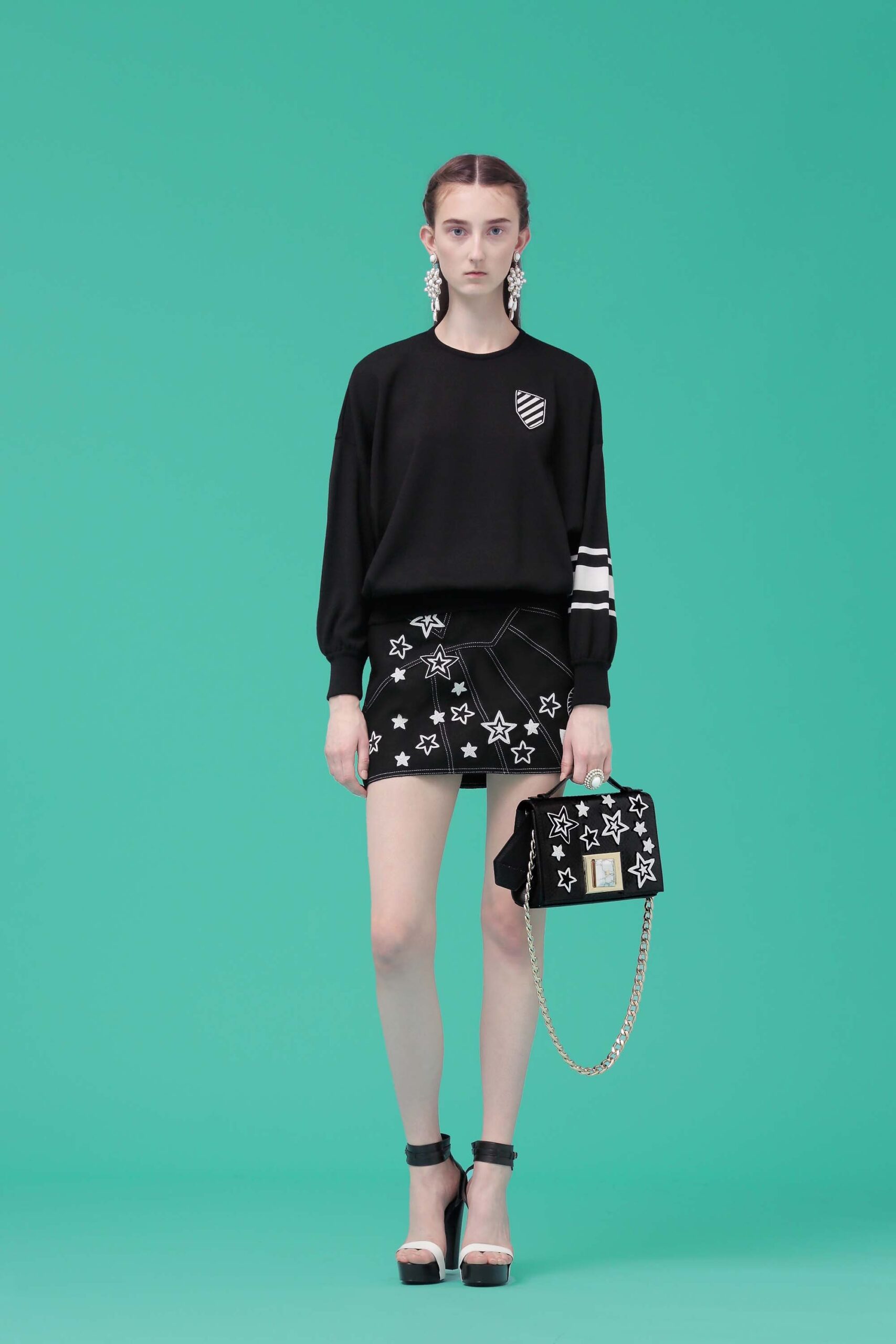 black relaxed top with mini skirt