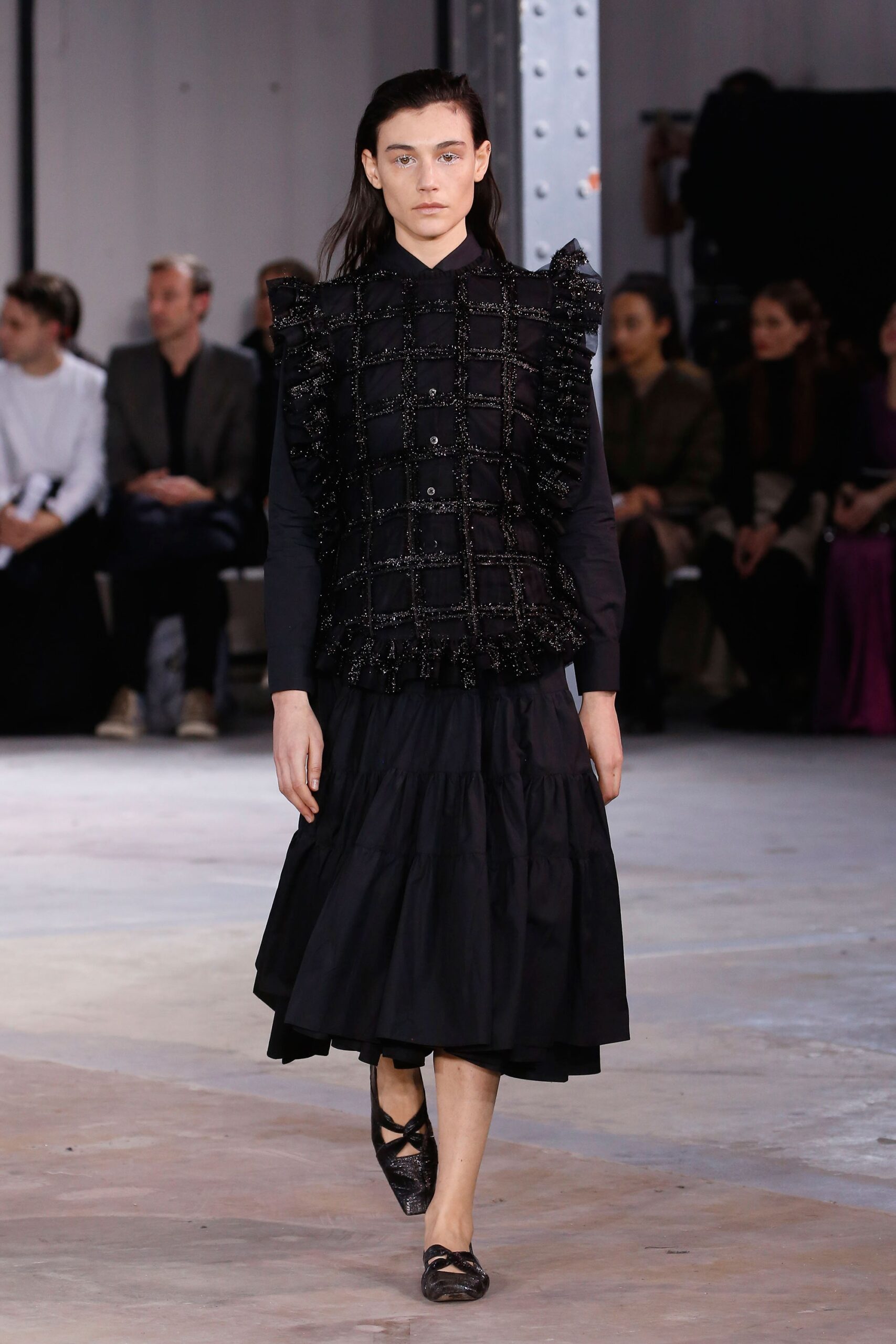 black ruffled top and tiered skirt