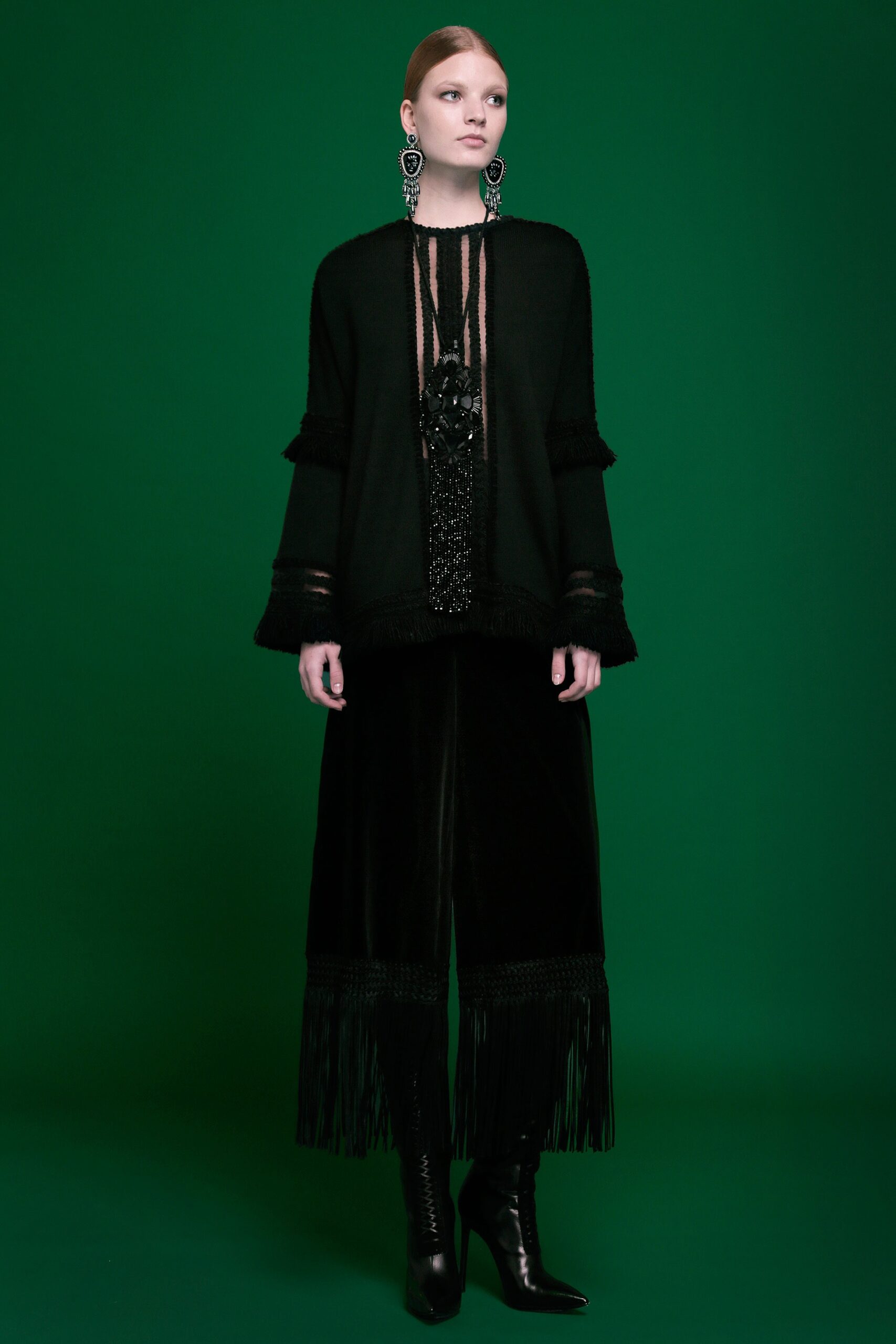 black relaxed top with fringed pants