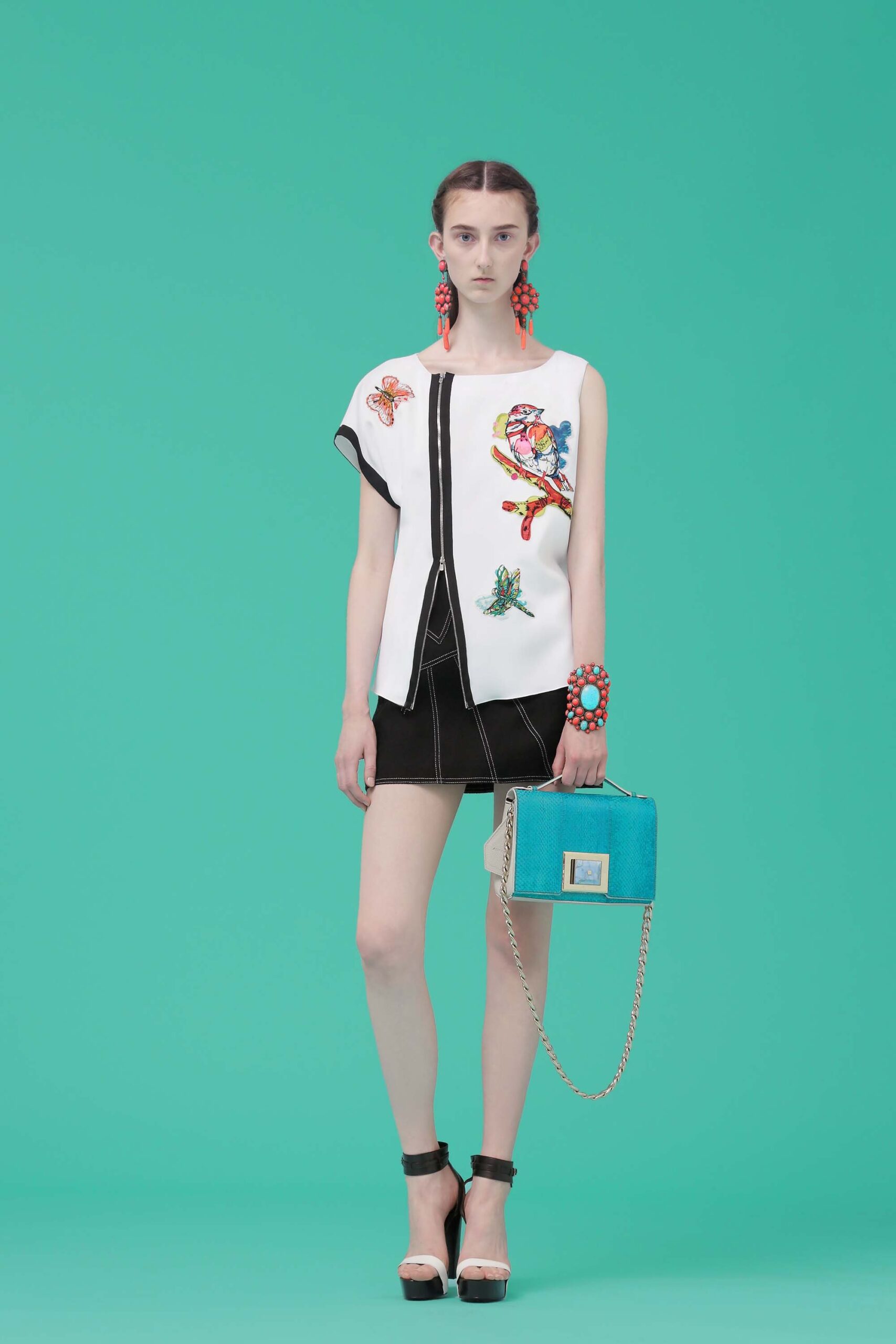 white embroidered top with black skirt
