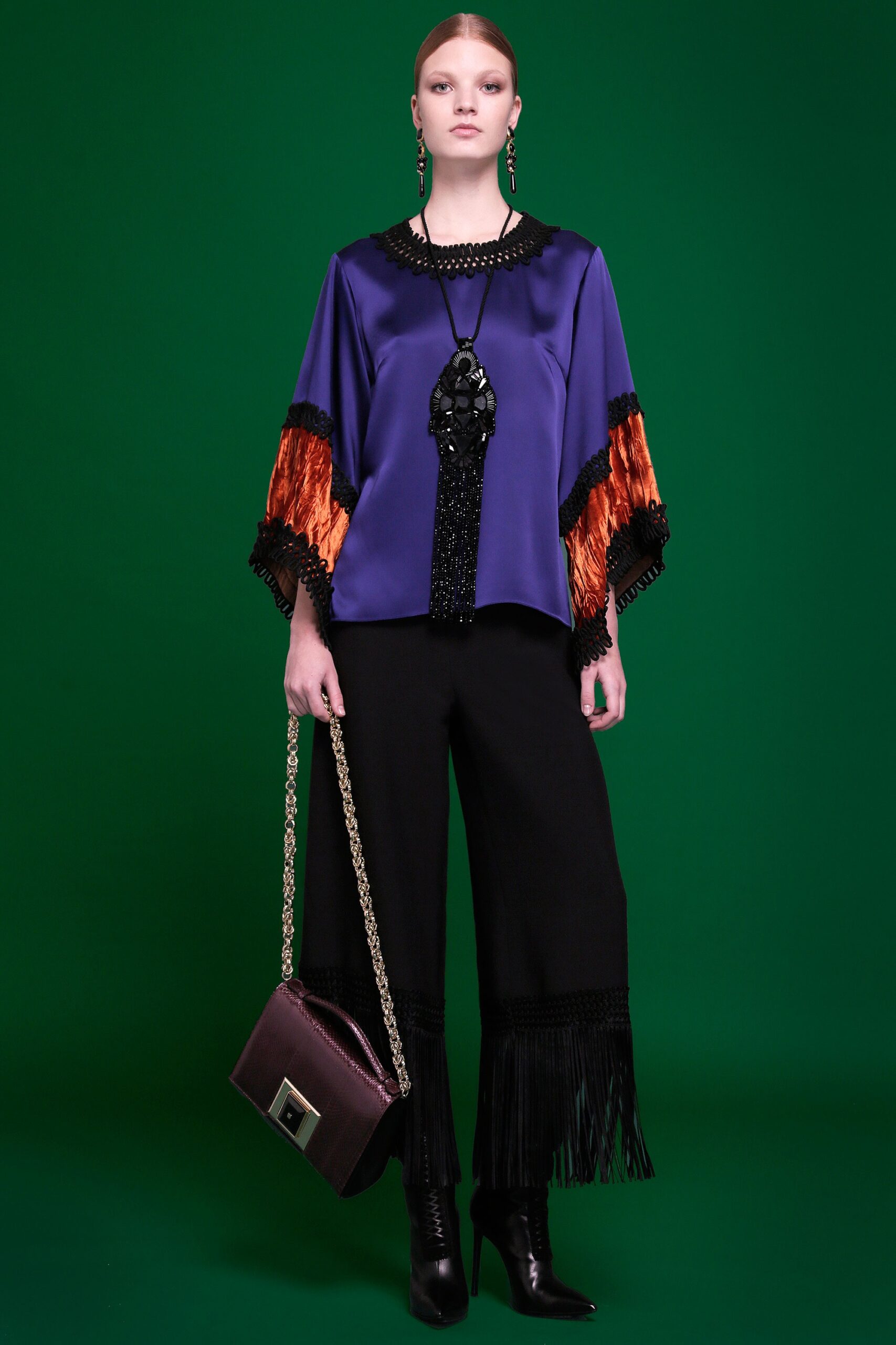 purple silk top with fringed pants