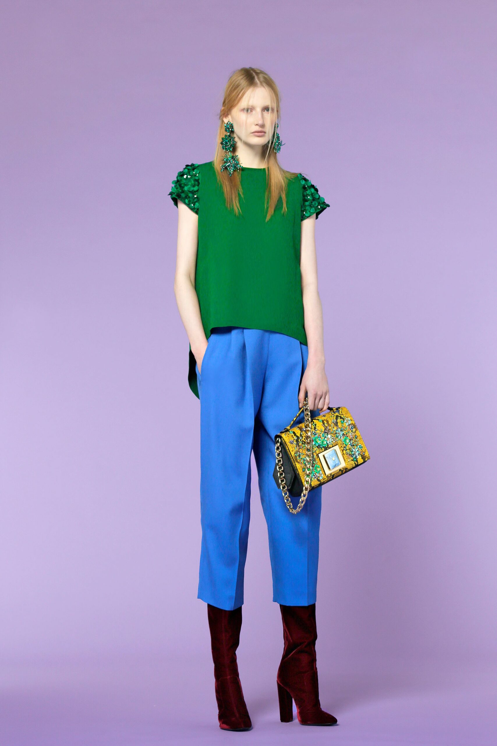green embellished top with blue pants