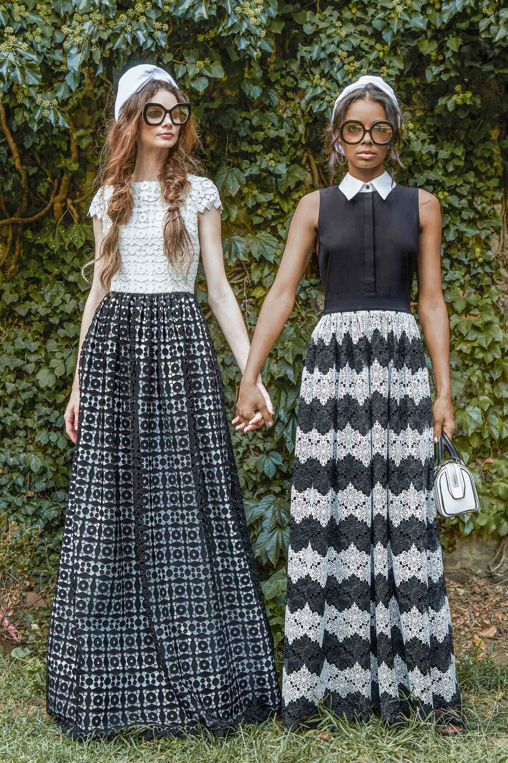 white embroidered top with black skirt