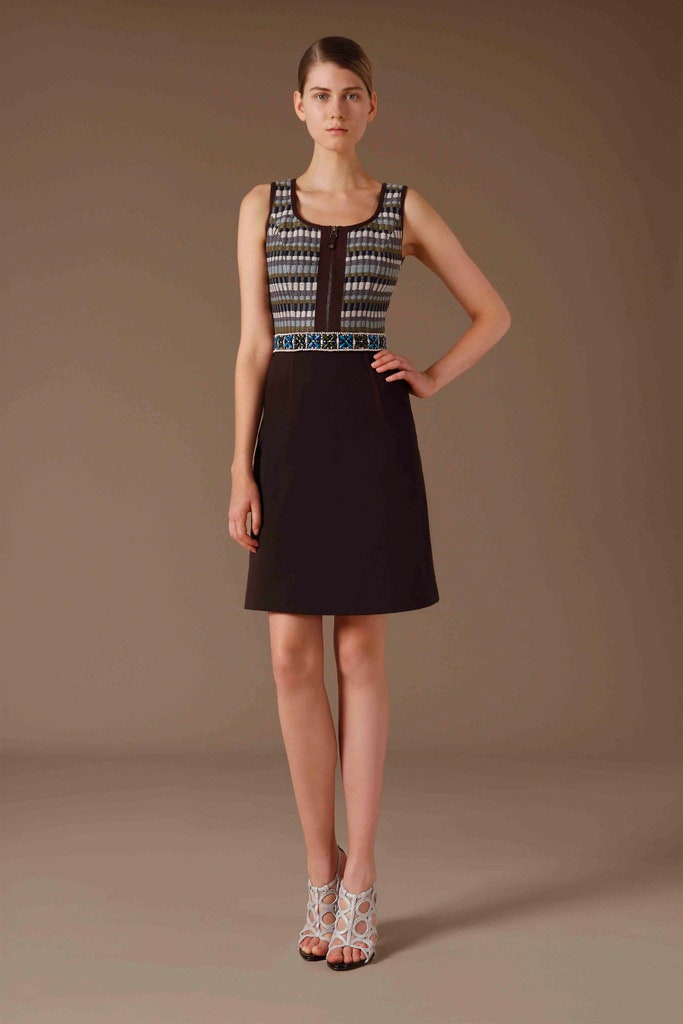 fitted black sleeveless dress