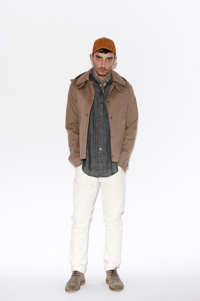 brown jacket gray shirt white pants