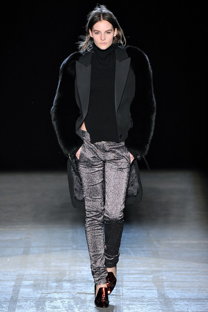black structured jacket with silver pants