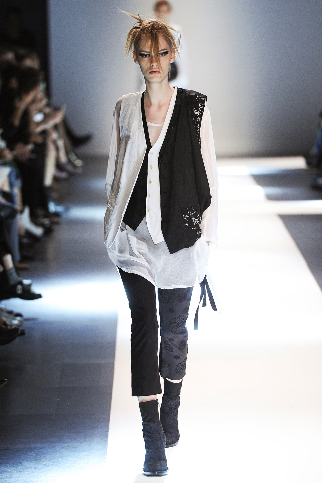black cotton vest with white shirt