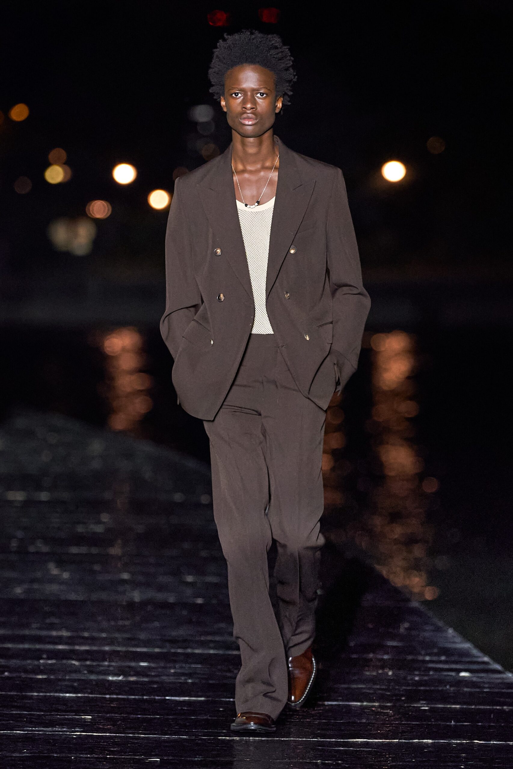 brown tailored suit with beige shirt