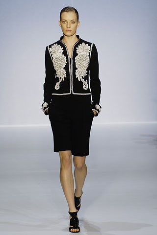 black fitted jacket with embroidered details