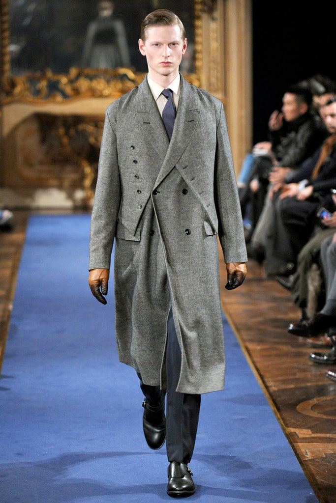 gray tailored coat with black pants