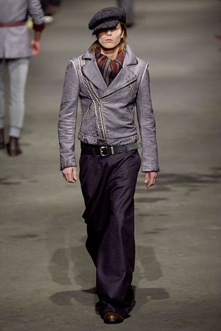 gray leather jacket with black pants