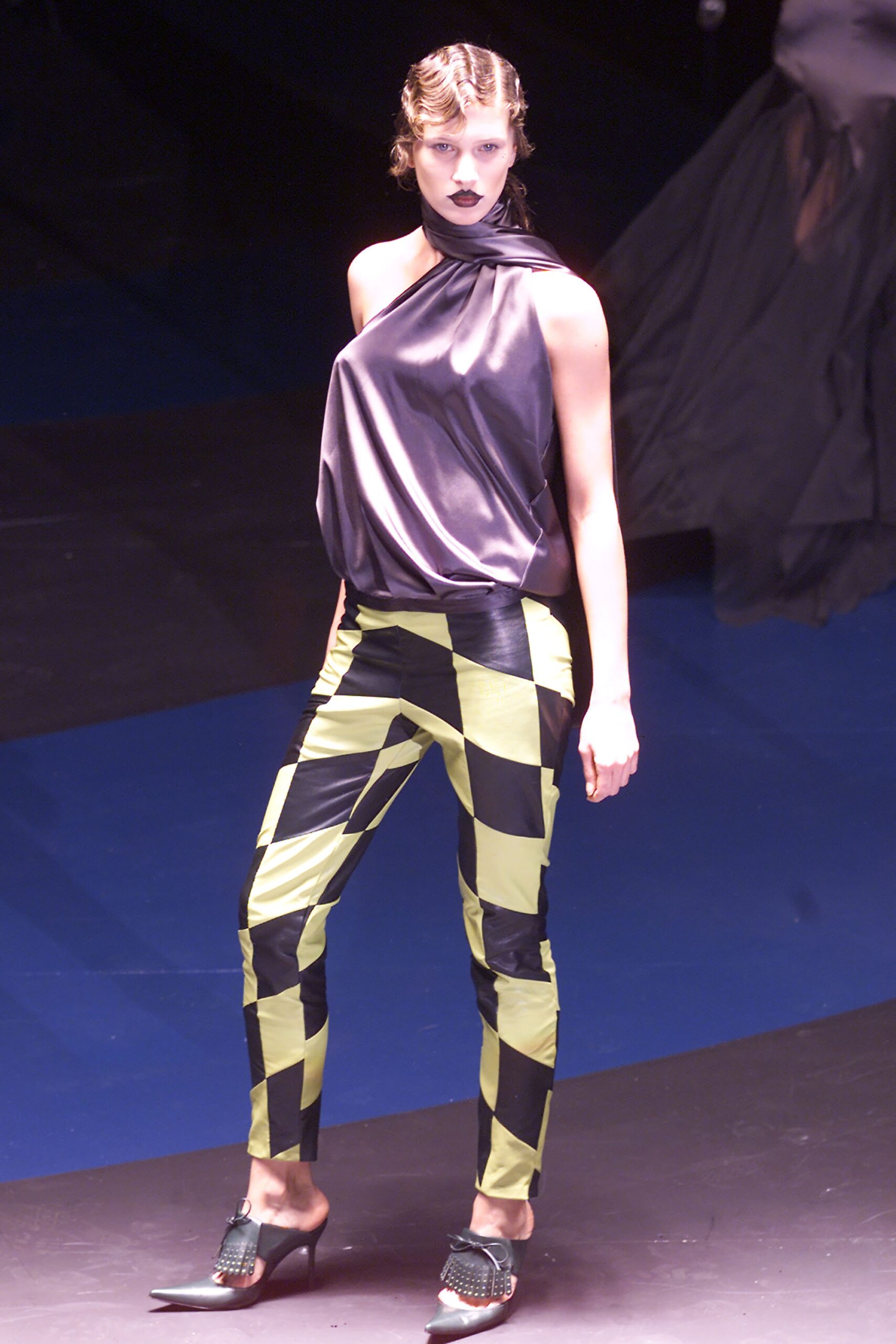 gray silk sleeveless top with checkered pants