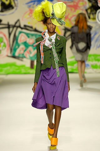 green blazer with purple skirt