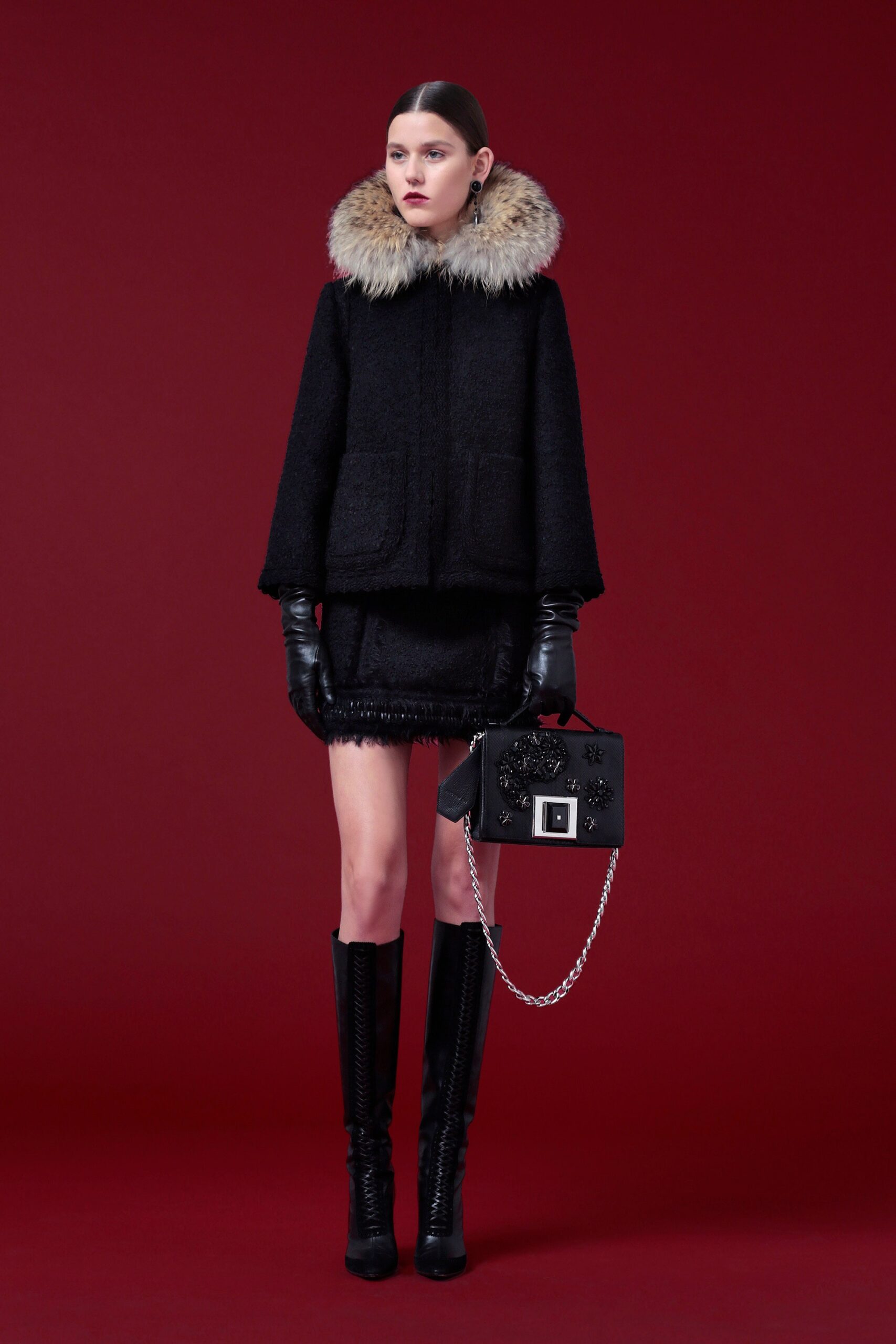 black wool coat with fringed skirt