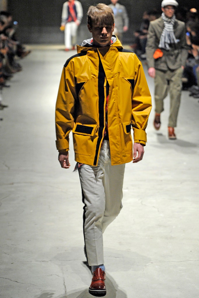 yellow vinyl jacket with white pants