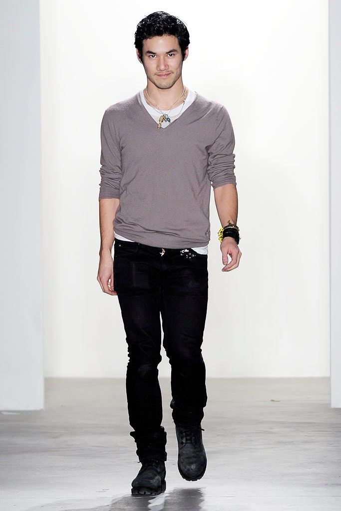 gray v-neck shirt with black pants