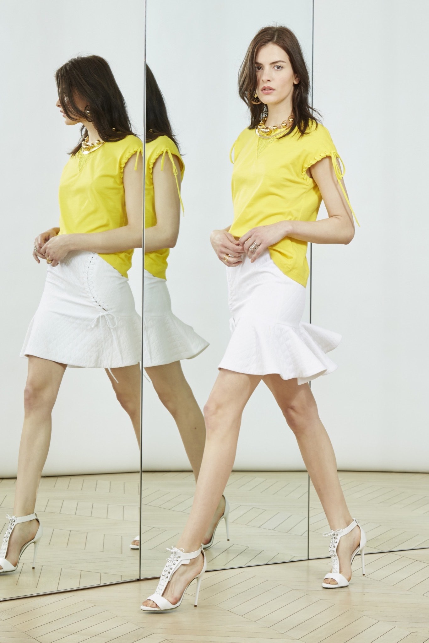 yellow fitted top with white skirt