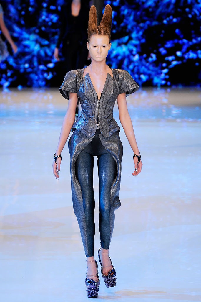 metallic gray jumpsuit with blue pants
