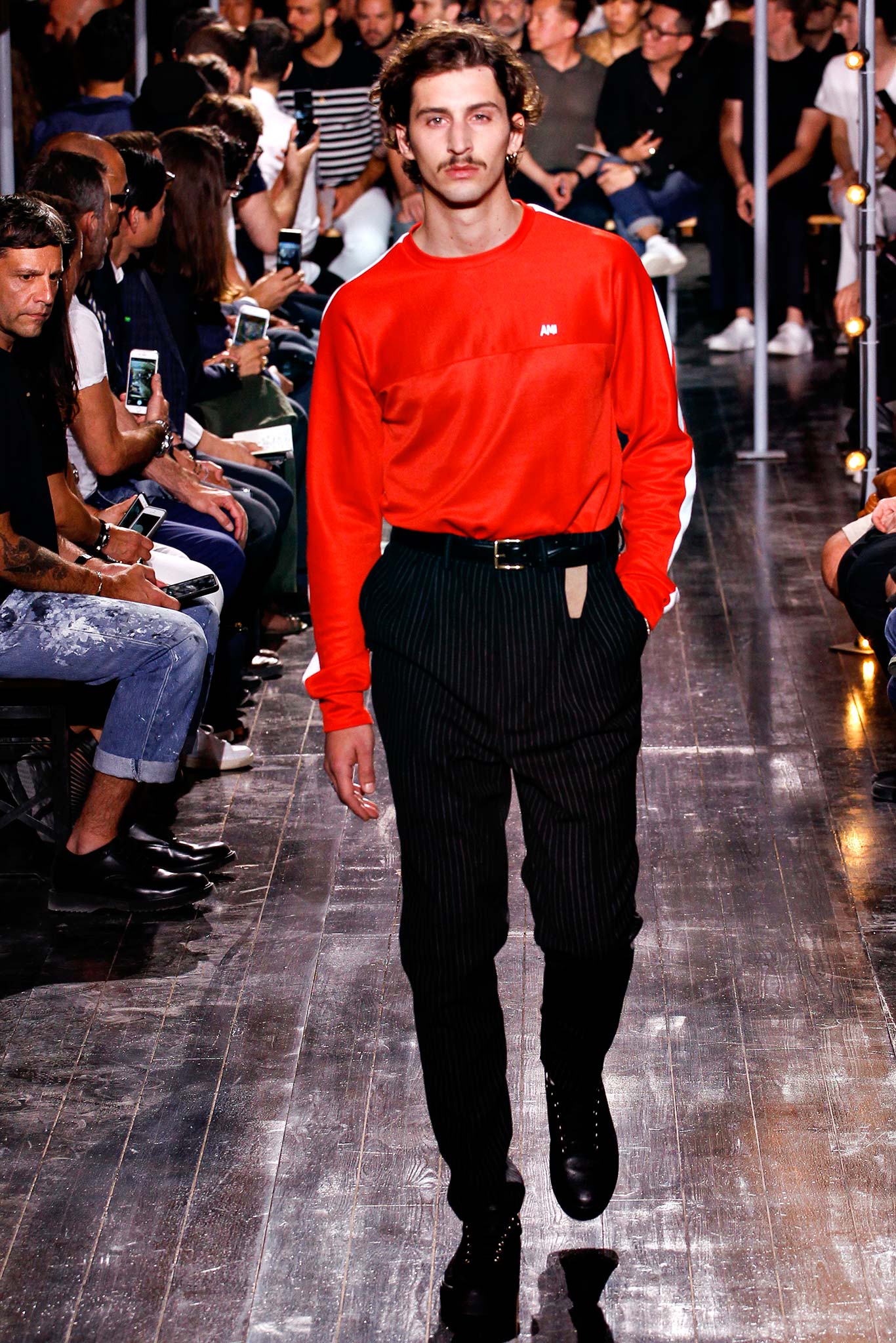red fitted long-sleeve top with tailored pants