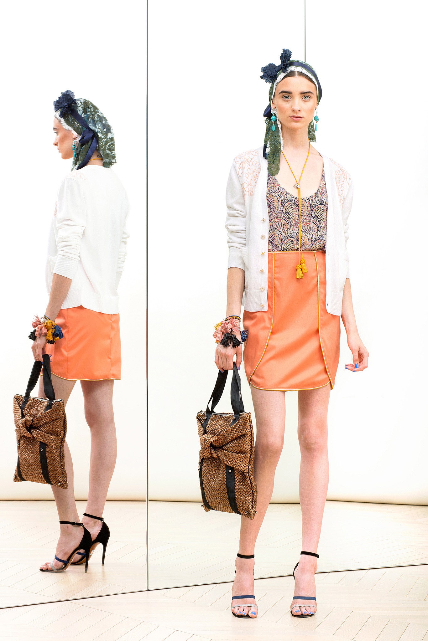 white cardigan multi printed top orange mini skirt