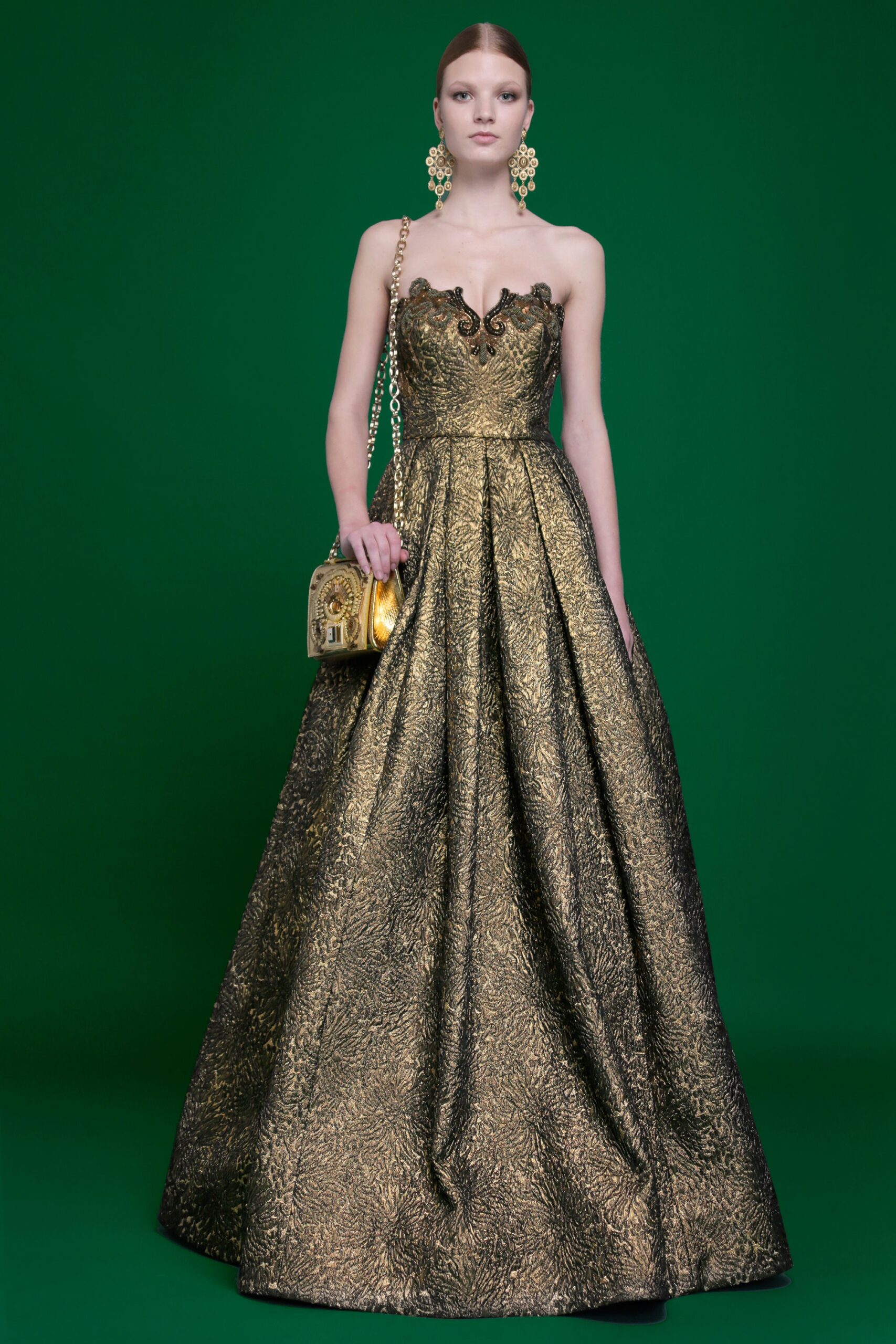 gold strapless pleated gown