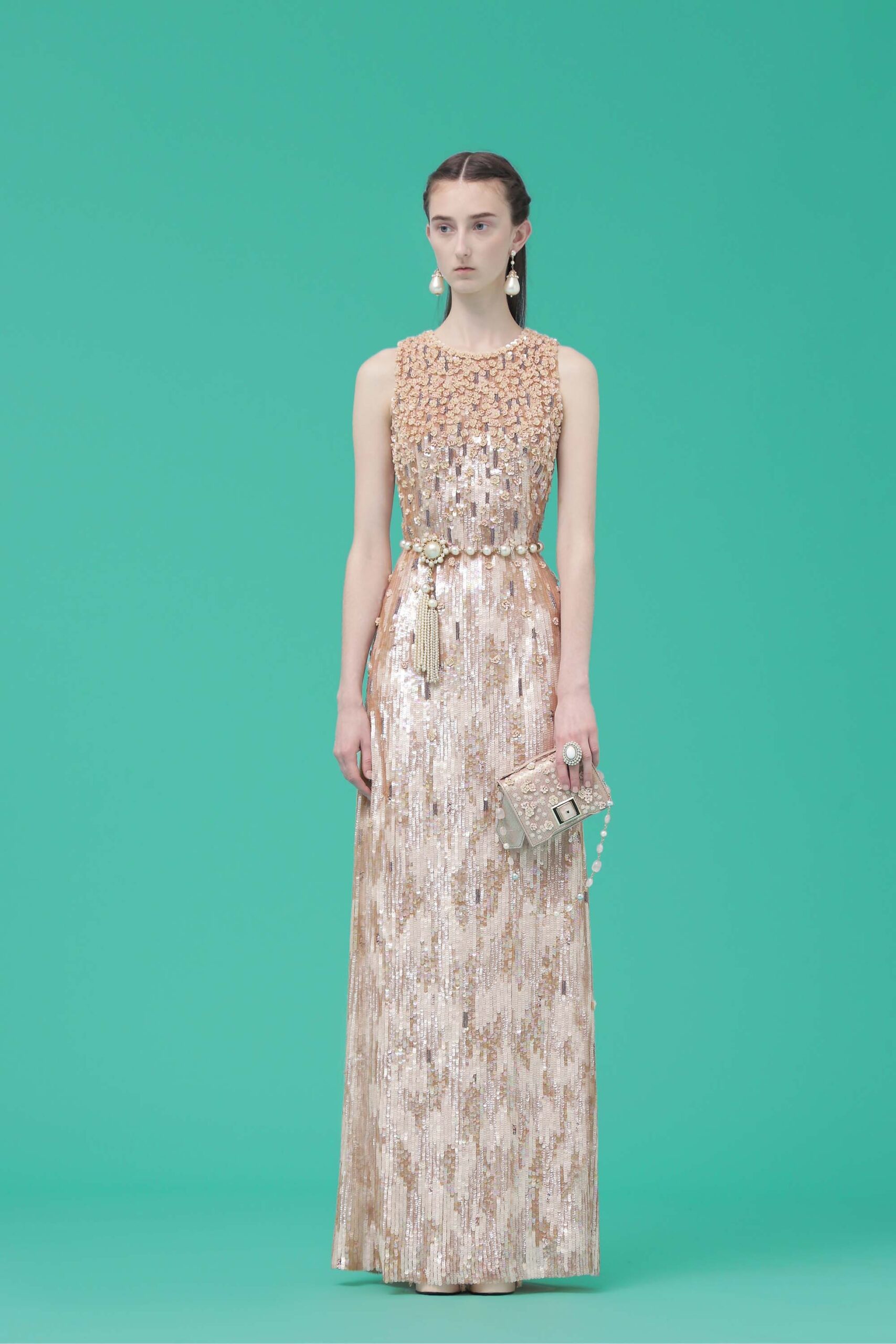 gold sequin sleeveless gown