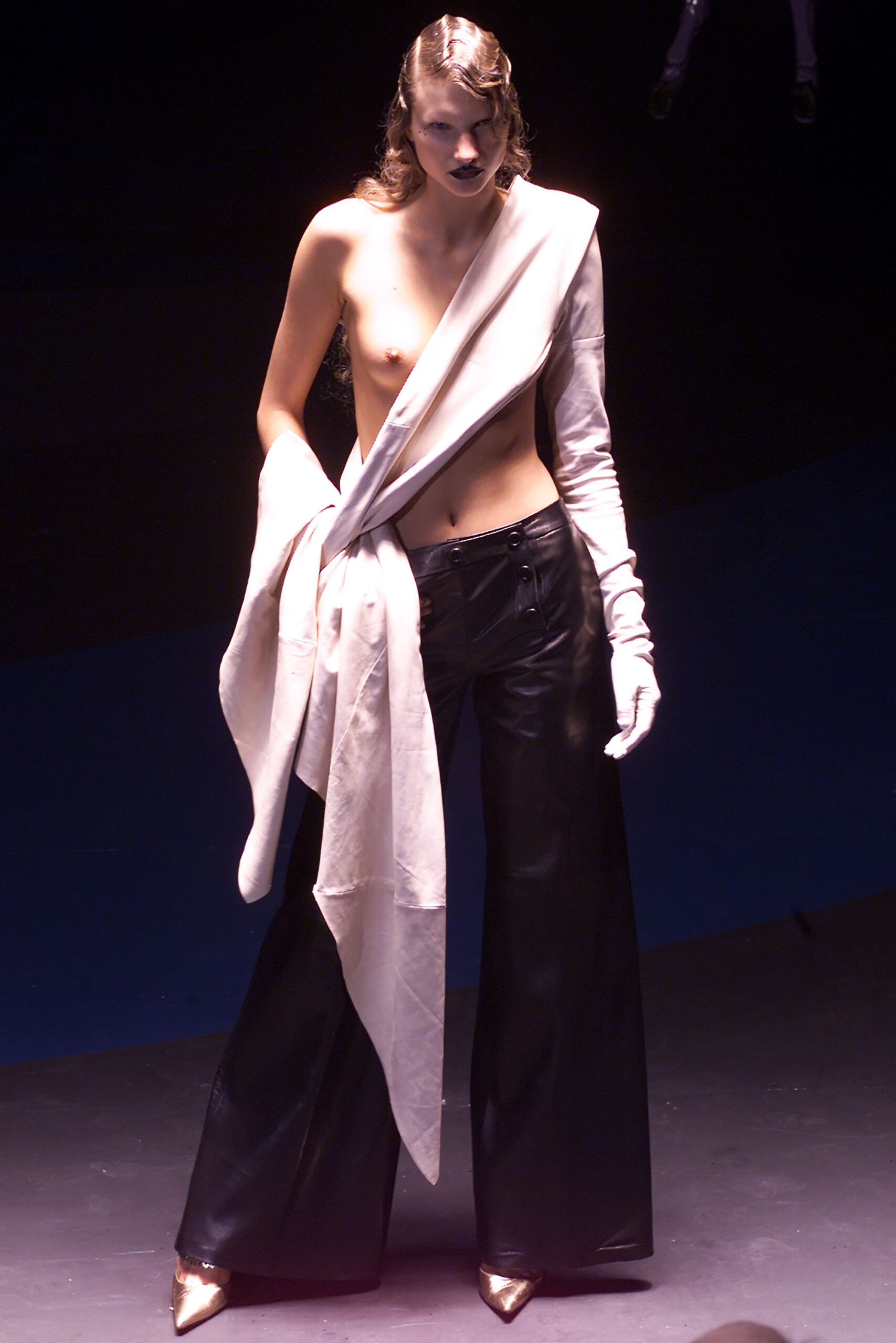 white draped top with black leather pants