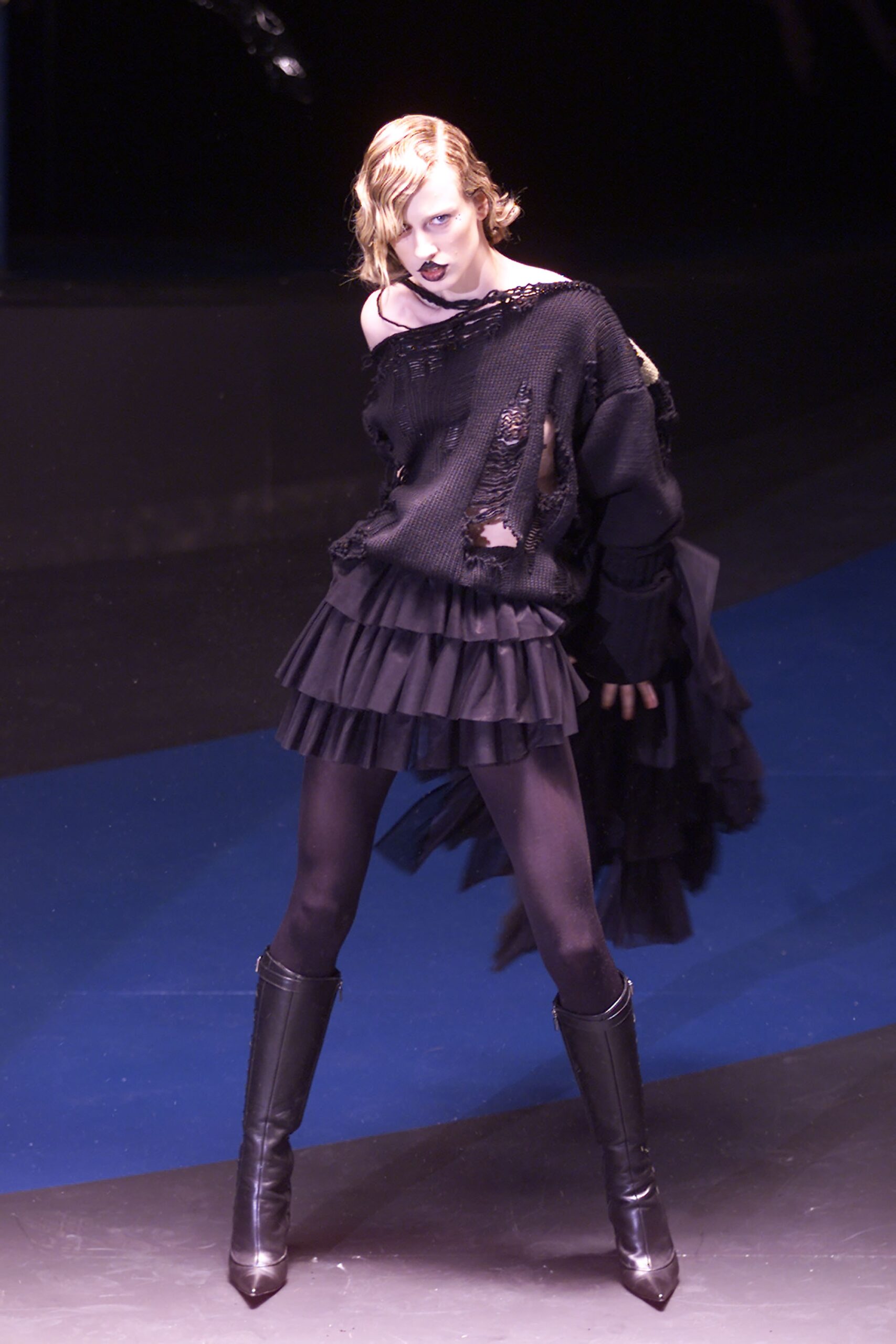 black distressed top with mini skirt