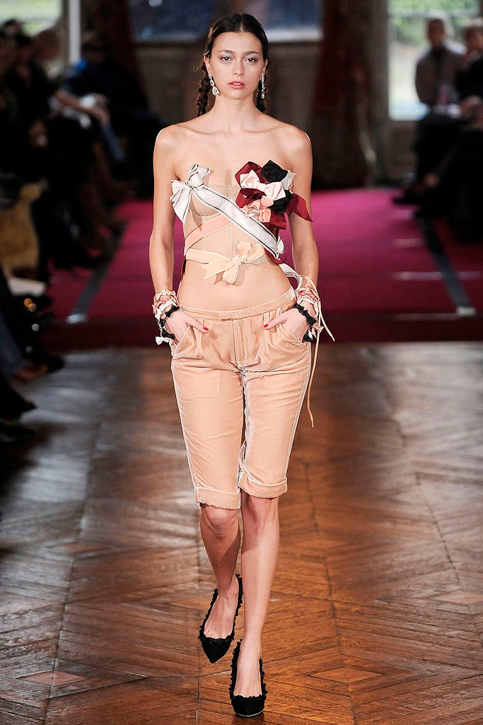 fitted beige pants and layered top