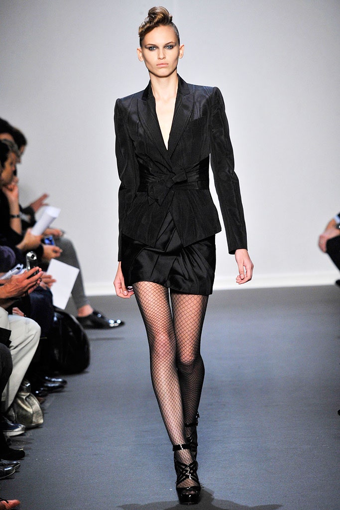 black fitted blazer and mini skirt