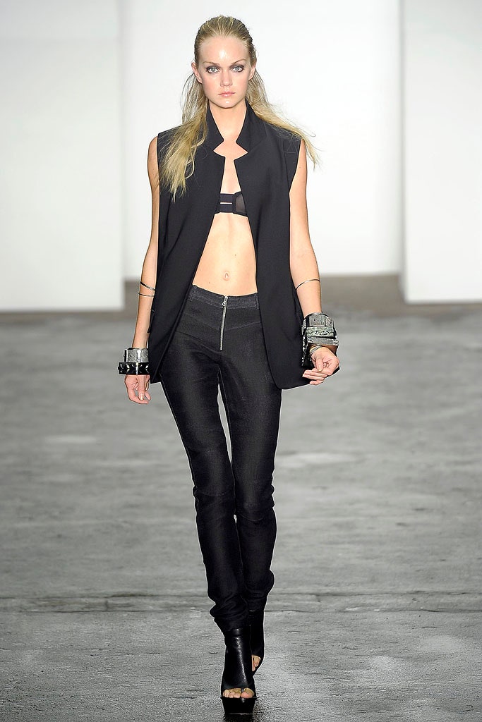 black fitted blazer and slim pants