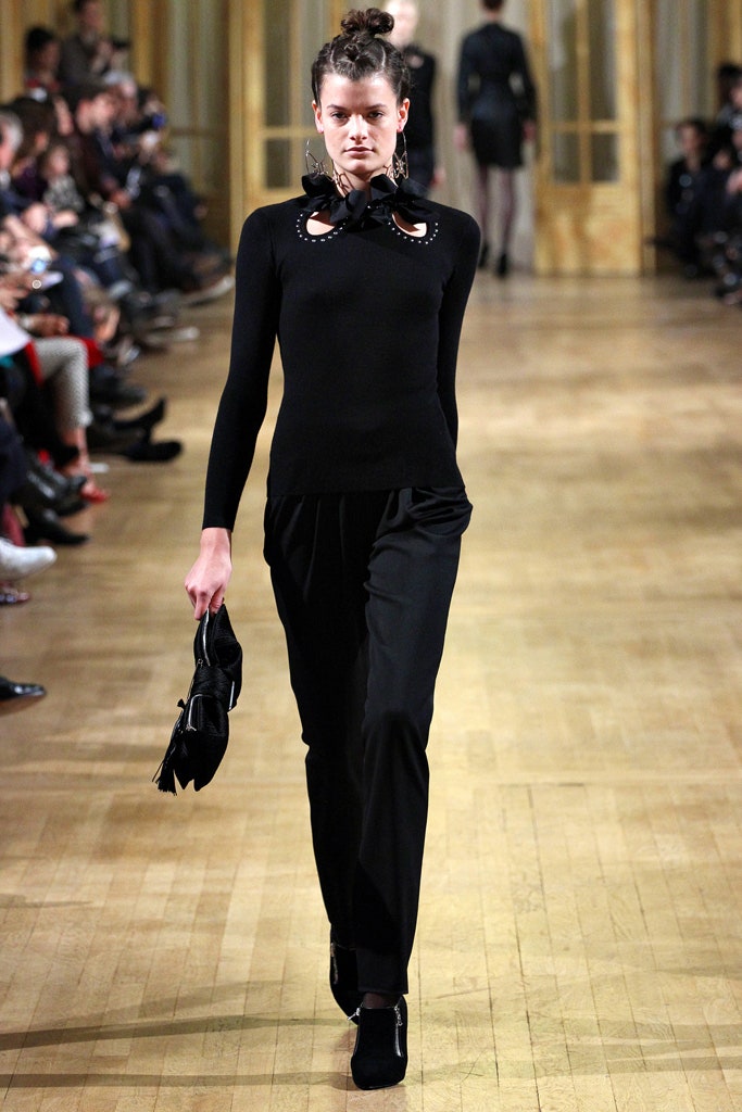 black fitted top and tailored pants