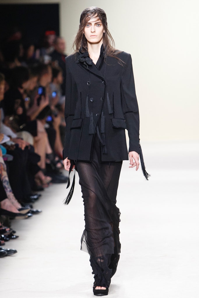 black relaxed jacket and fitted sheer skirt