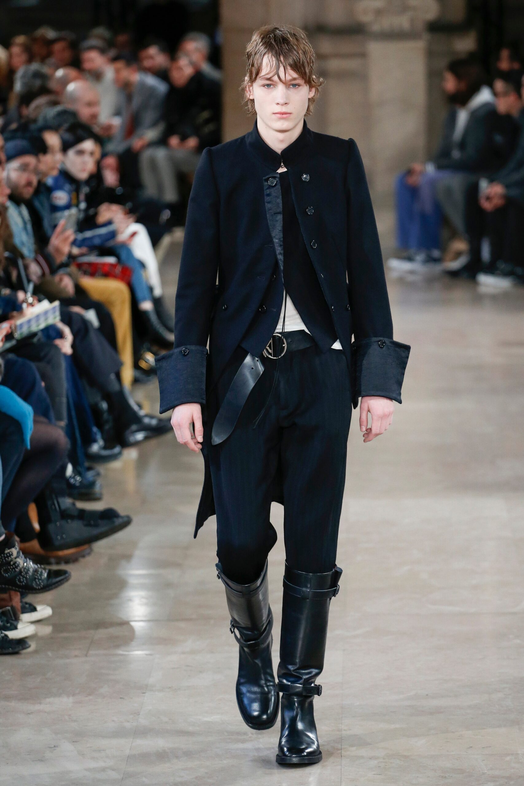 black wool coat with relaxed pants