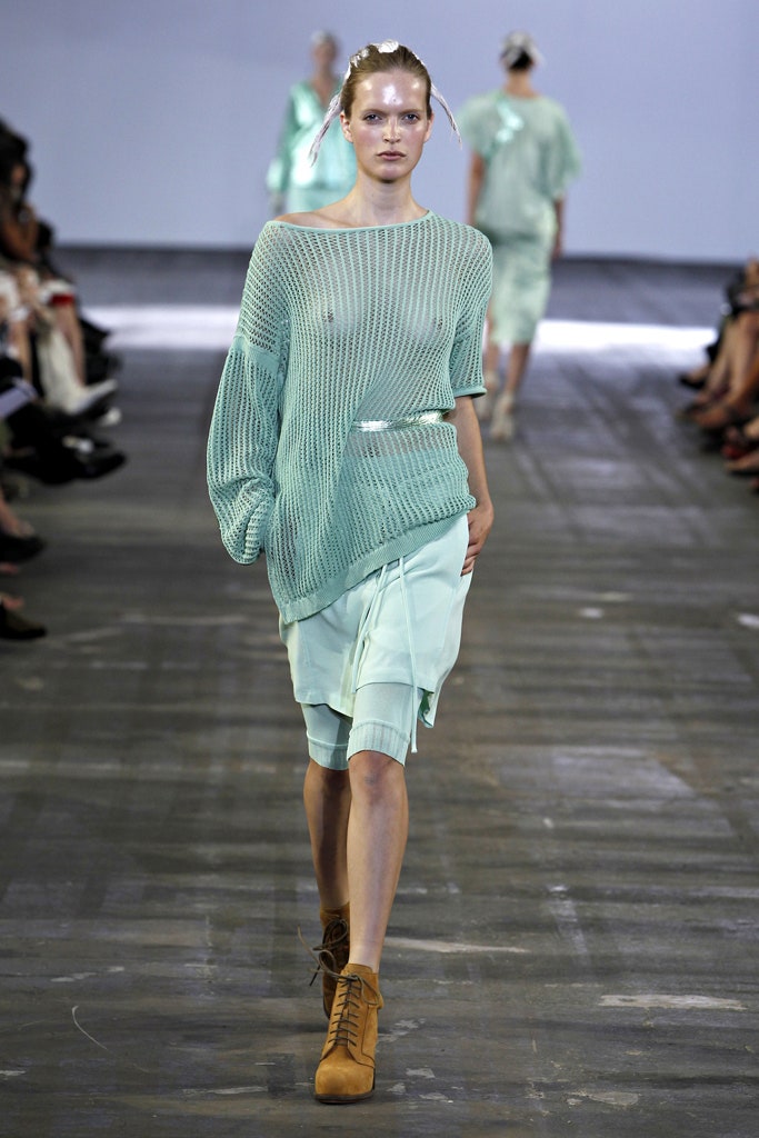 blue oversized top with mint pencil skirt
