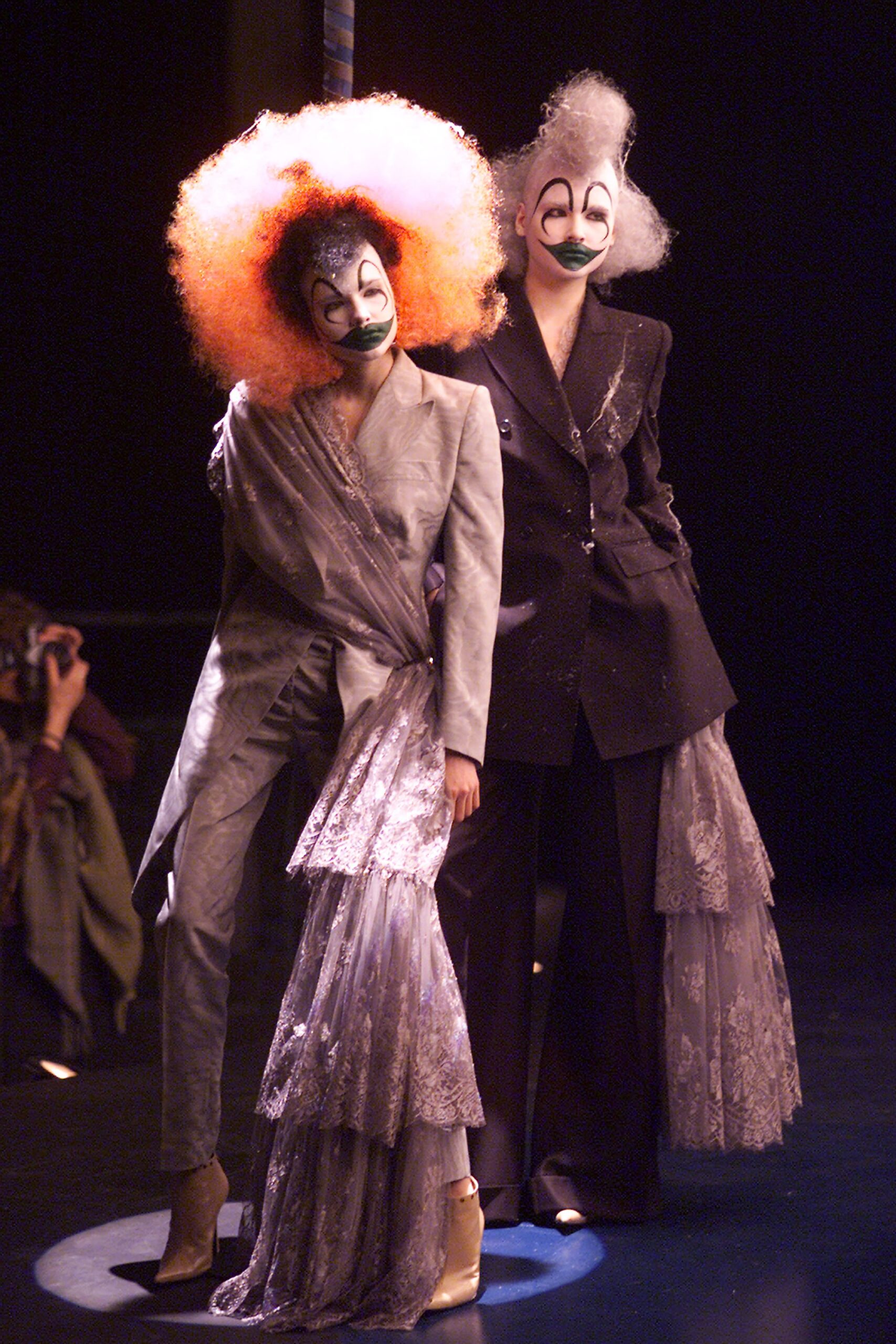 gray silk fitted suit and black lace gown