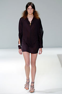 black silk mini dress with strappy shoes