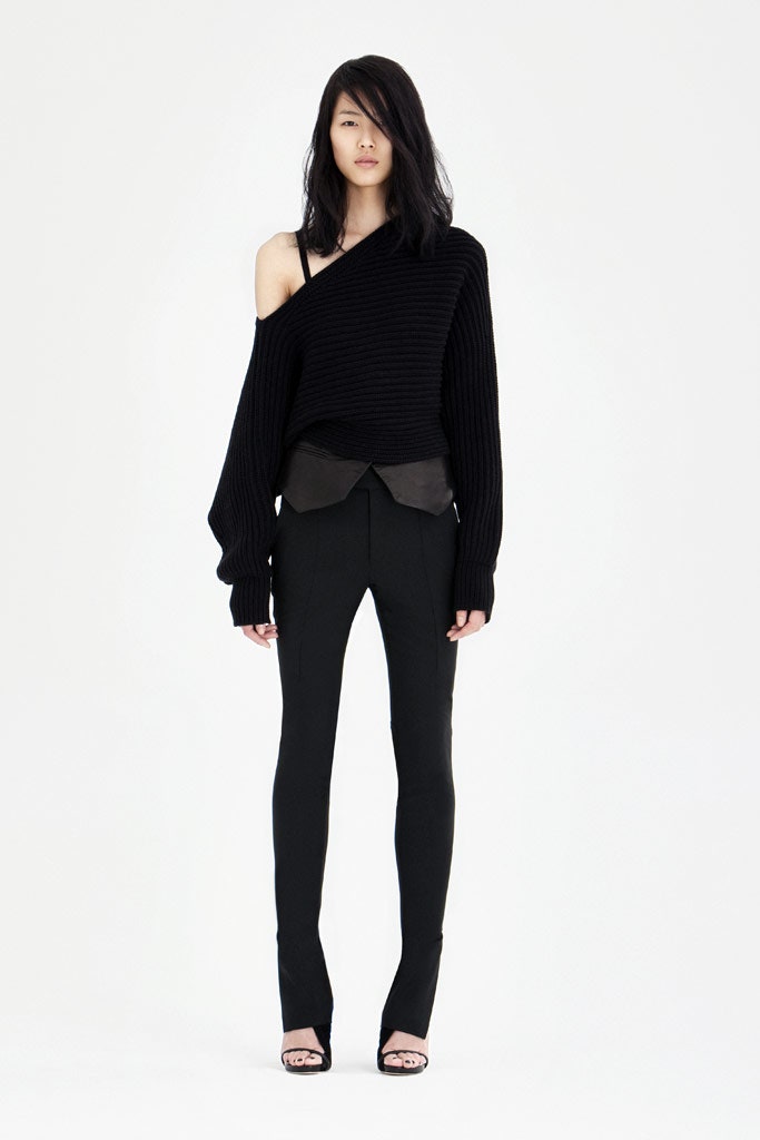 black oversized sweater and fitted pants
