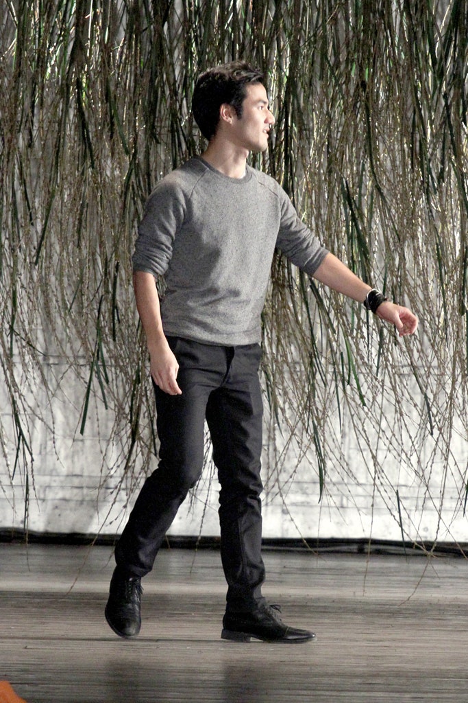 gray relaxed sweater with black pants