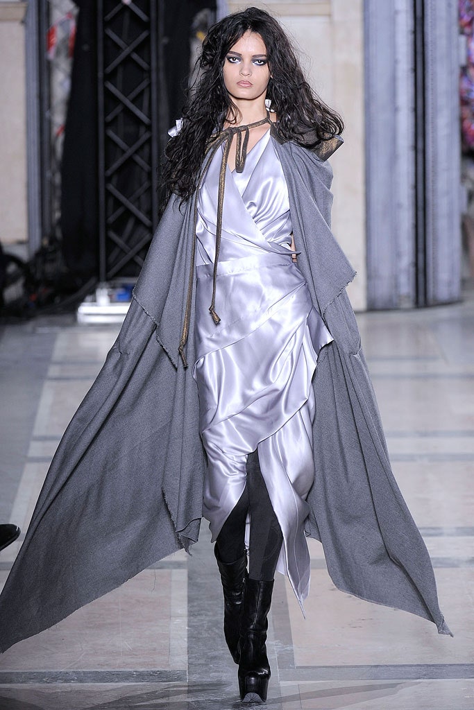 silver silk draped dress with gray coat