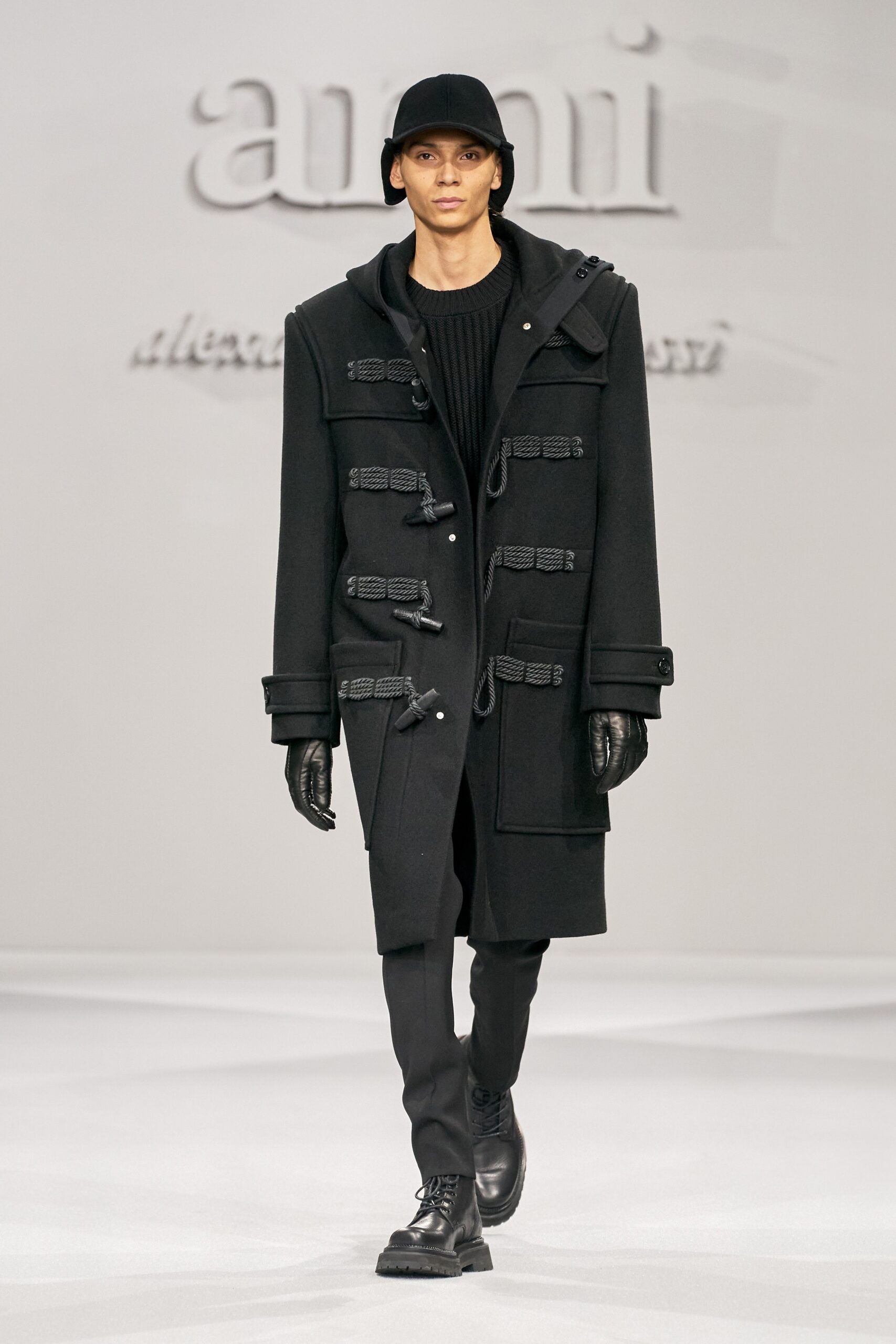 black wool coat with knit top
